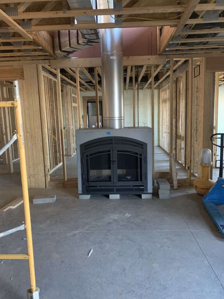 new fireplace installed in framed home