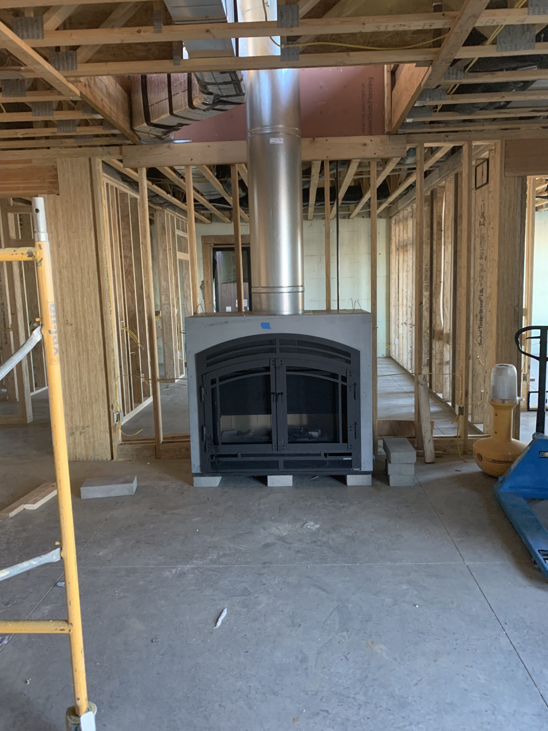 new fireplace installed in framed home