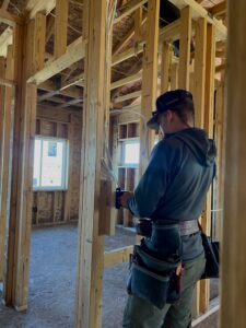 electrician installing new home rough-in wiring
