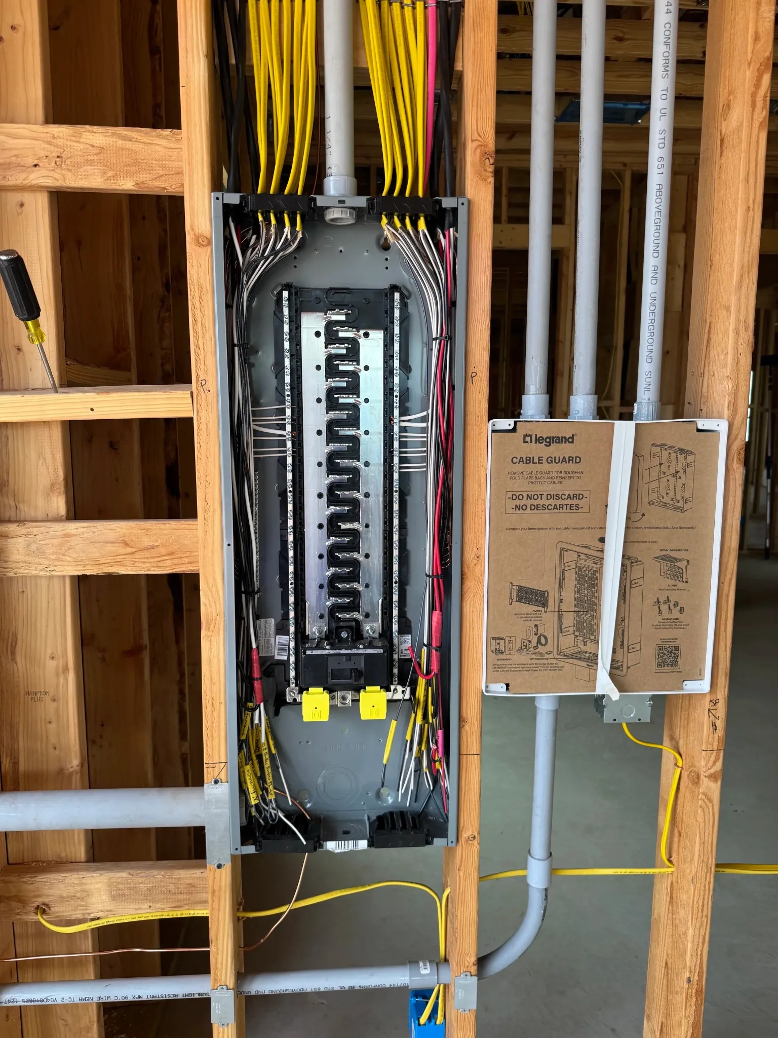 Residential electrical rough-in: panel and conduit during home construction